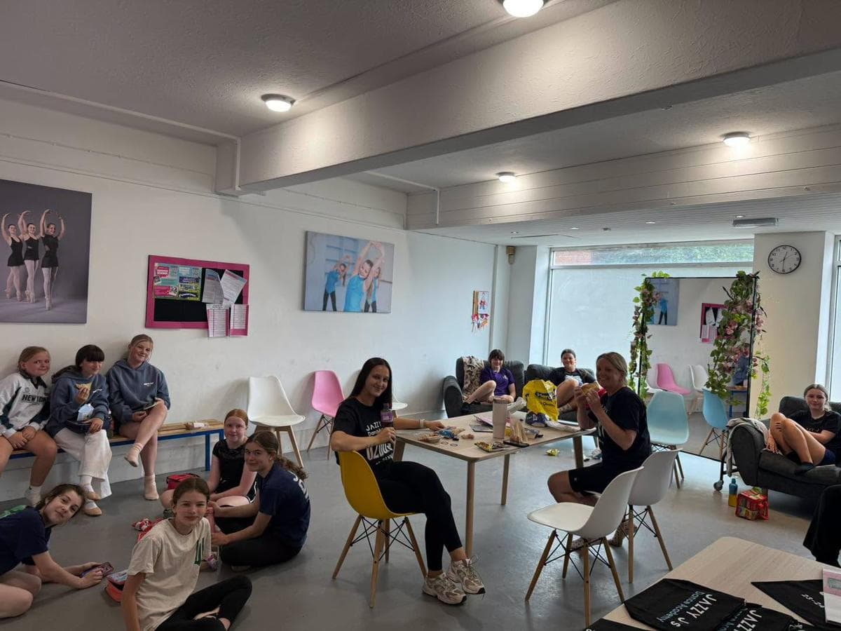 Parents and pupils relaxing in the waiting area