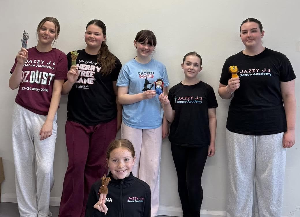 Teachers in OzDust show T-shirts