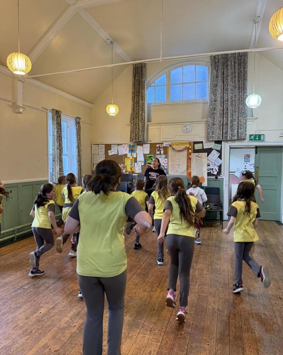 Children dancing at a free community workshop