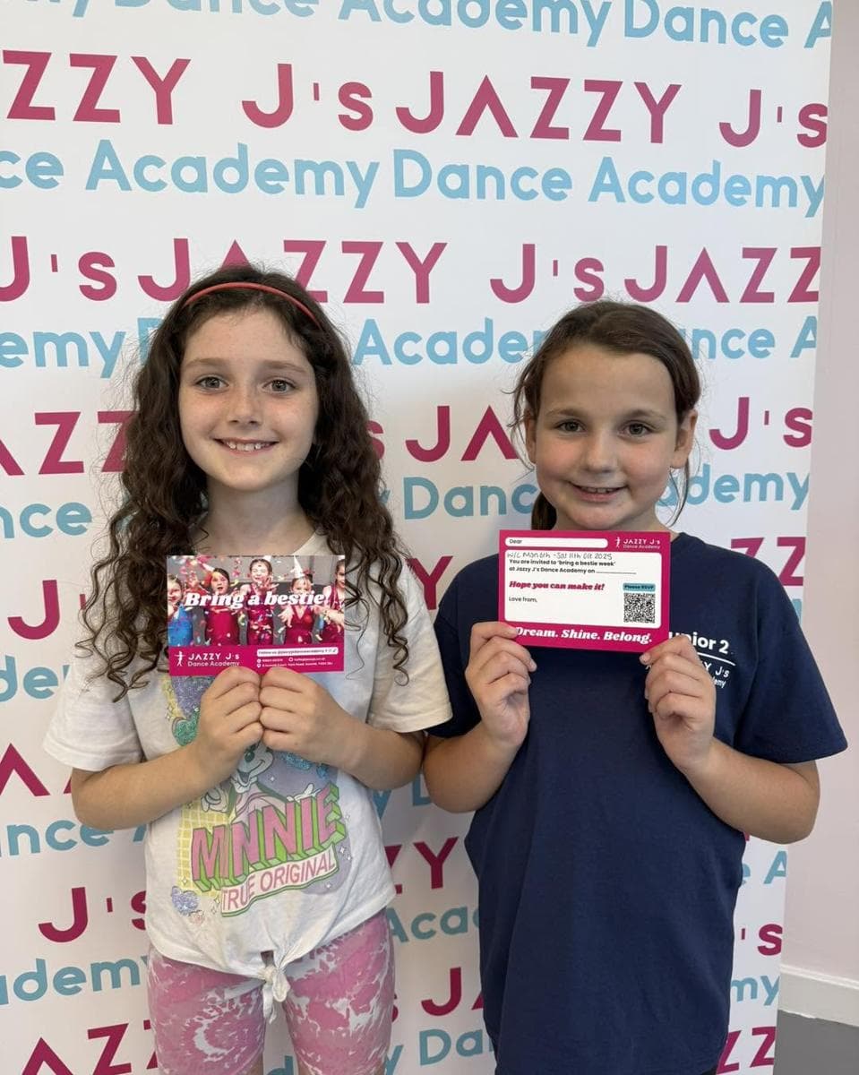 Two children holding Bring a Bestie invites