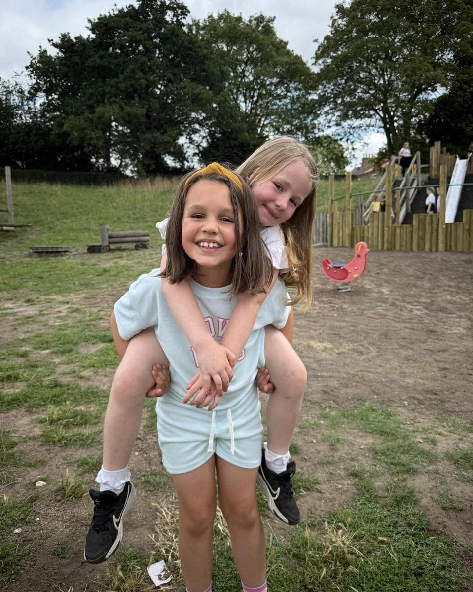 A piggyback in the park at summer school